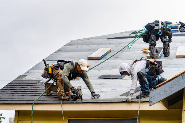 Professional Roofing technician working in Bishop, CA
